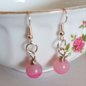 A new pair of pink semi precious earrings.